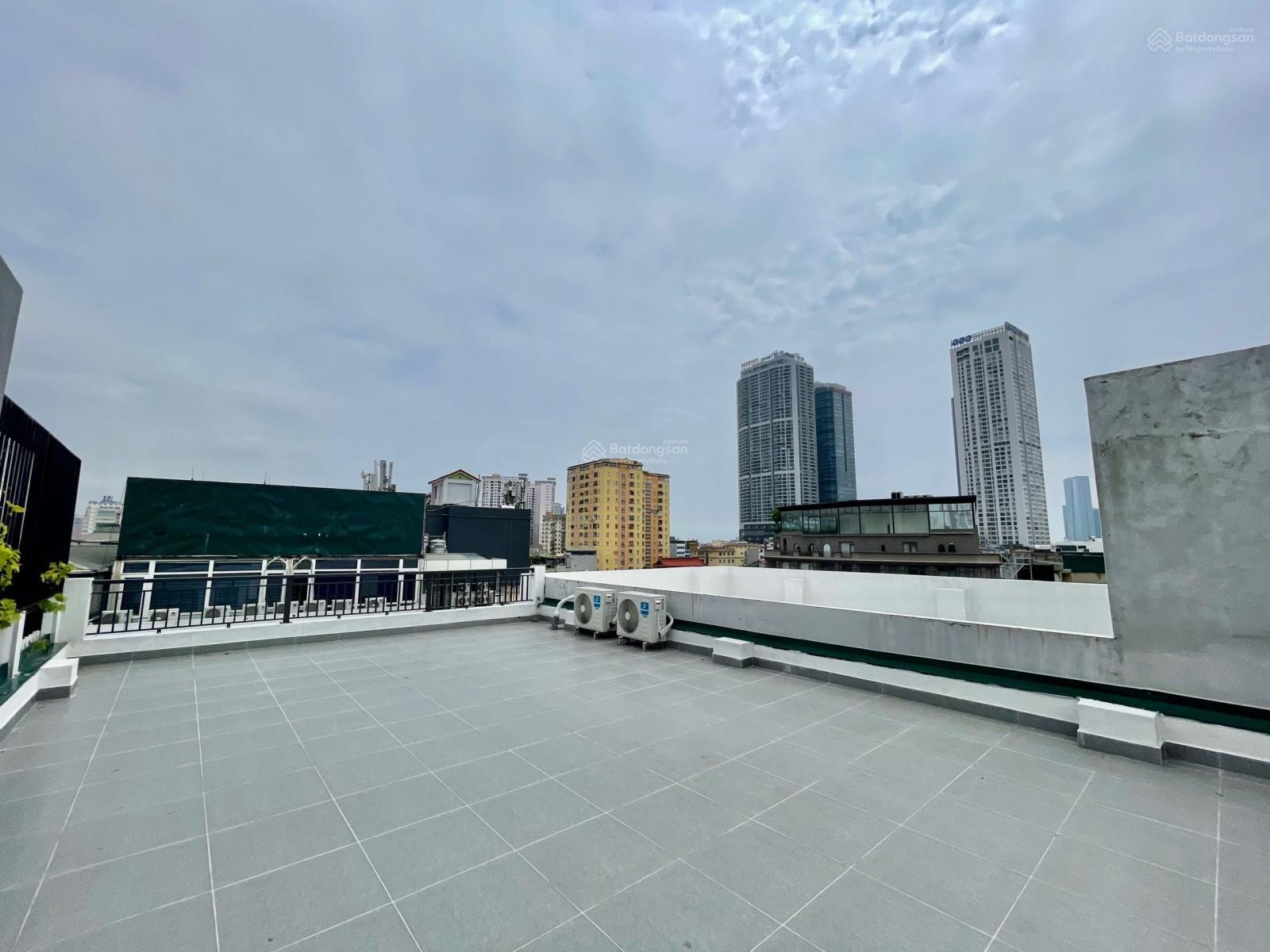 Cho thuê tòa nhà Duy Tân - Trần Thái Tông 135m2 MT 6m 6T nổi 1 hầm thông sàn. Giá 60 triệu/tháng