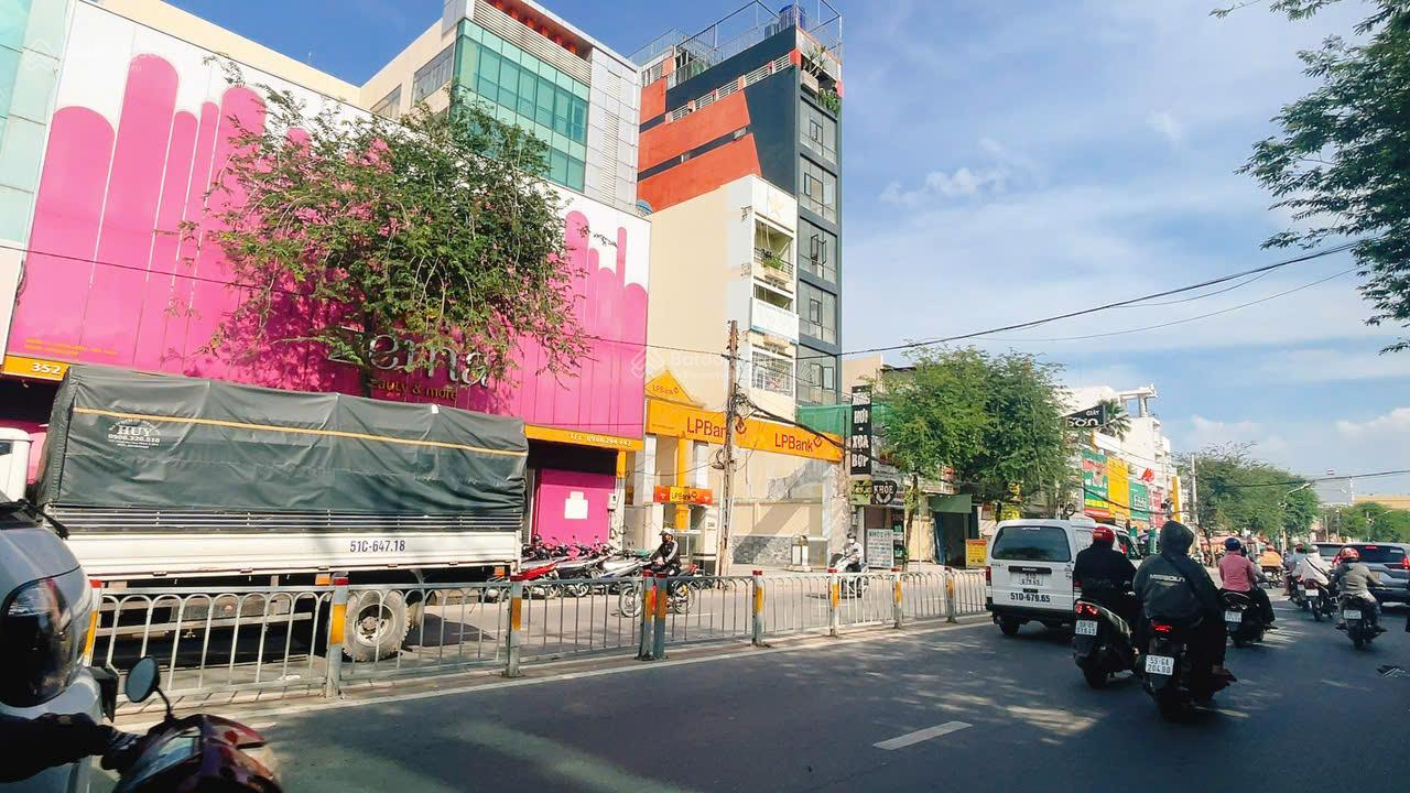 (Tin thật) Tòa nhà mặt tiền Trường Chinh 6x20m, nở hậu 13m. Đúc 7 tầng có sẵn HĐ thuê 120 tr/th