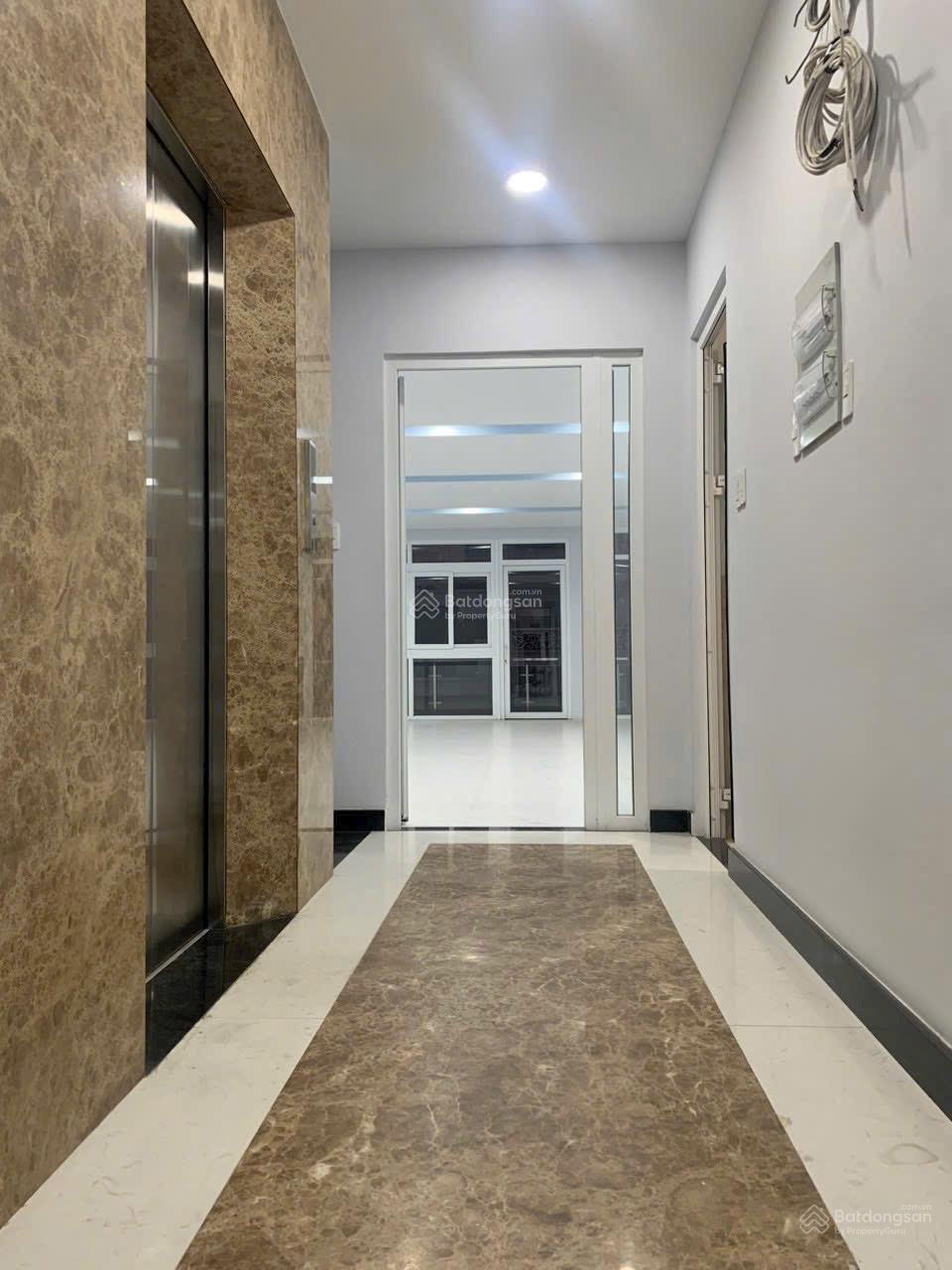 Toà nhà văn phòng Phan Đăng Lưu 281m2 5 tầng có hầm DTSD 1200m2 chỉ 52 tỷ