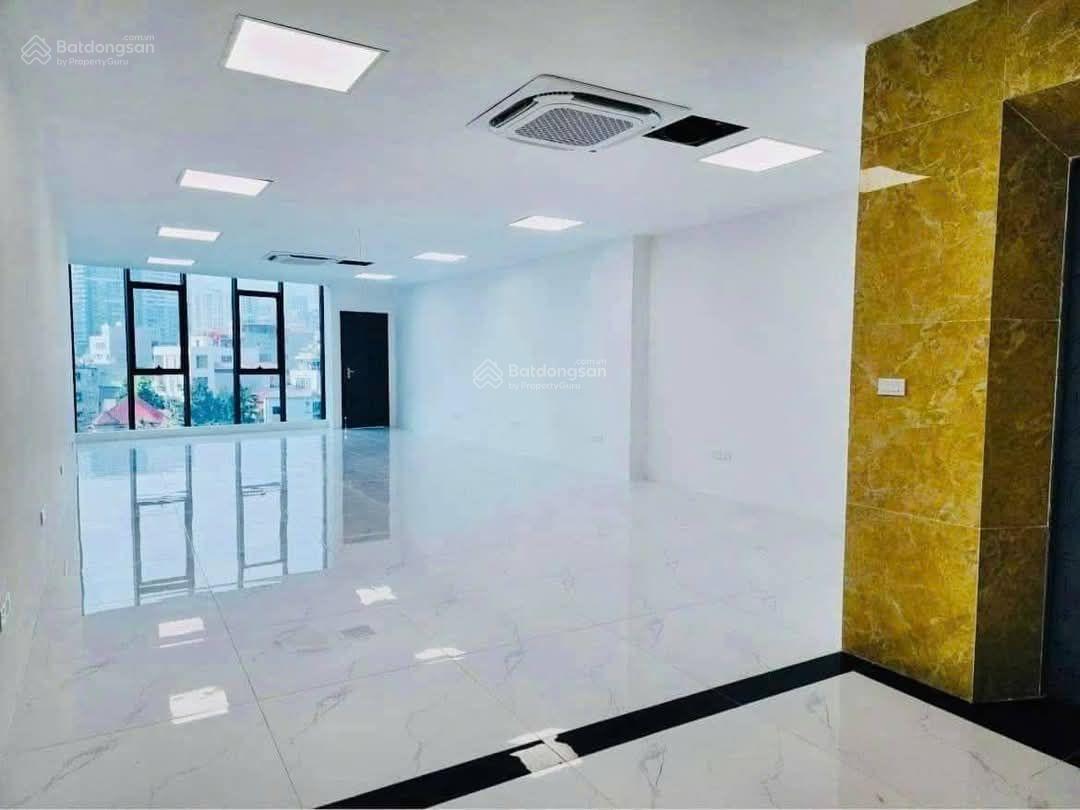 (Hiếm) Bán toà nhà VP, bán đảo Linh Đàm 203m2, 7 tầng, 72 tỷ, lô góc - 3 mặt thoáng, vỉa hè rộng