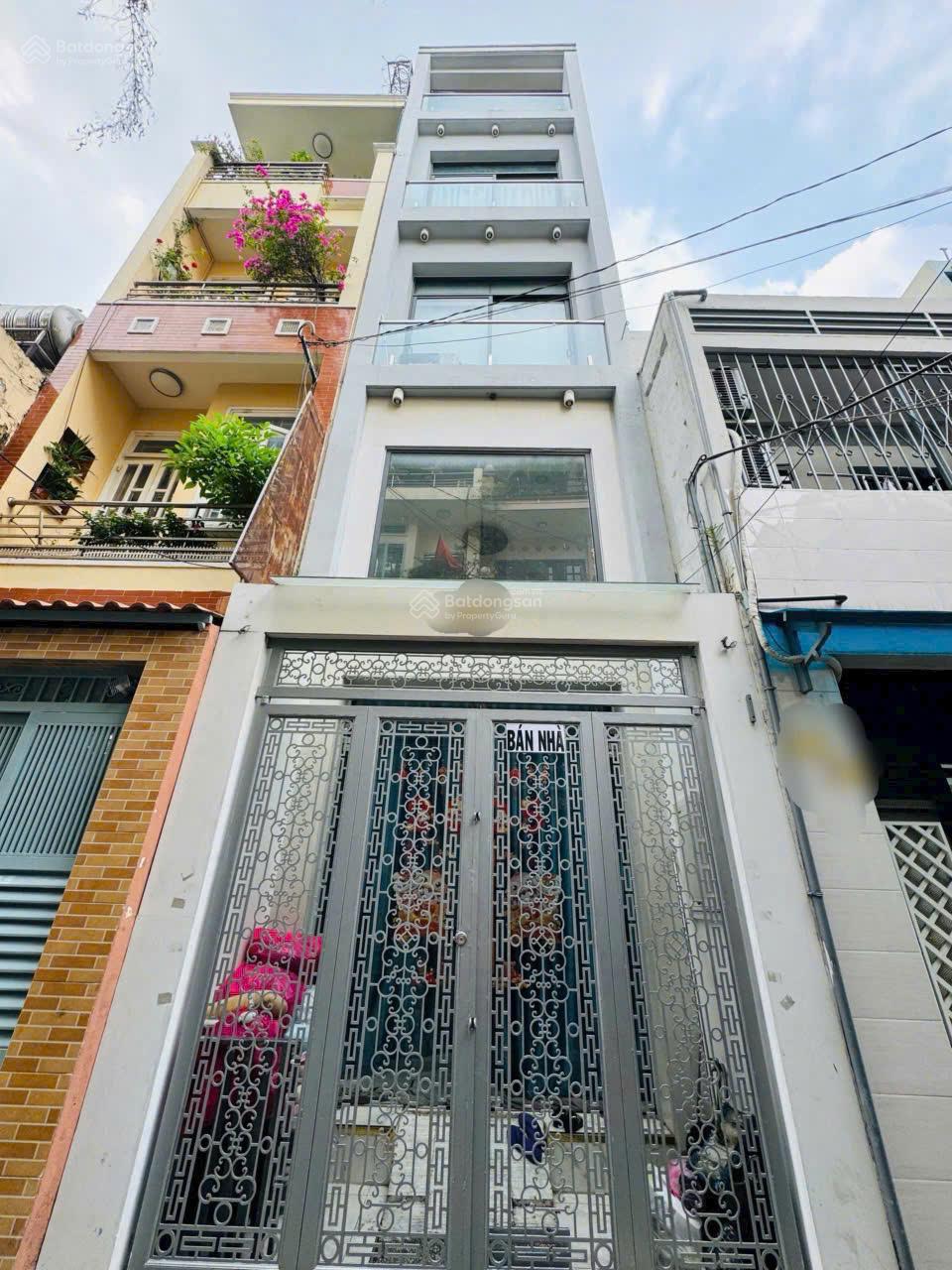Nhà mới hẻm 4m CMT8 (3.1m x 12m), 5 tầng có thang máy. Giá 7.7 tỷ TL