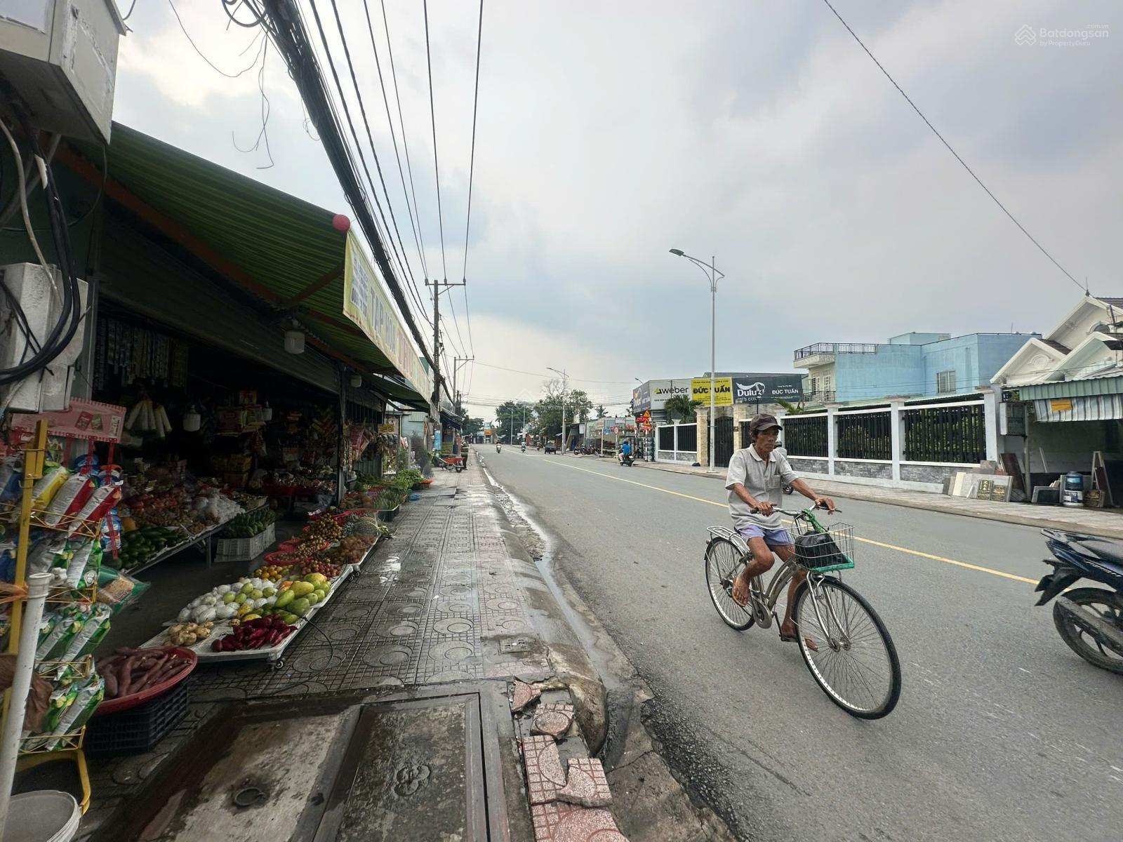 Bán lô đất mặt tiền đường nhựa 5m oto vào tới nhà diện tích 87,8m2(5x18m) kinh doanh buôn bán được