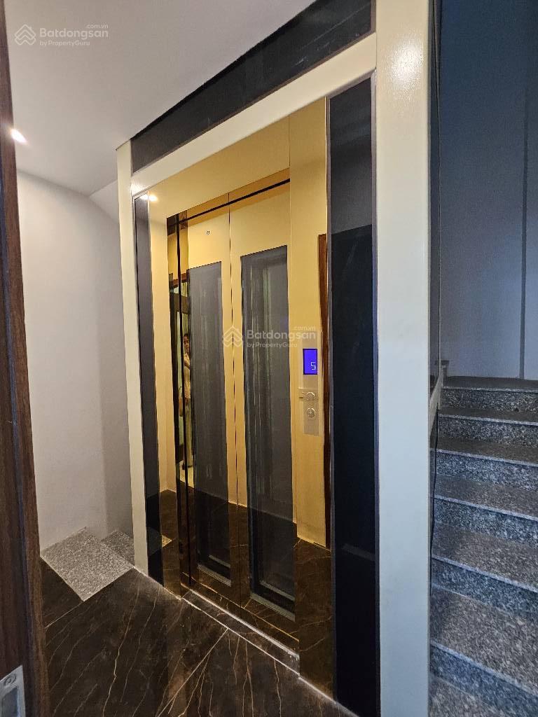 Nhà dân xây PHỐ TRẠM độc lập 1 căn 50M2x 6 tầng thang máy , sổ nở hậu