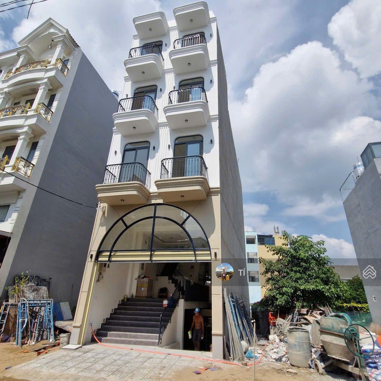 CHDV 12 phòng thu nhập 35tr khoán DT 5x20 hầm trệt 3 lầu Nguyễn Ảnh Thủ hẻm xe tải giá 10 tỷ