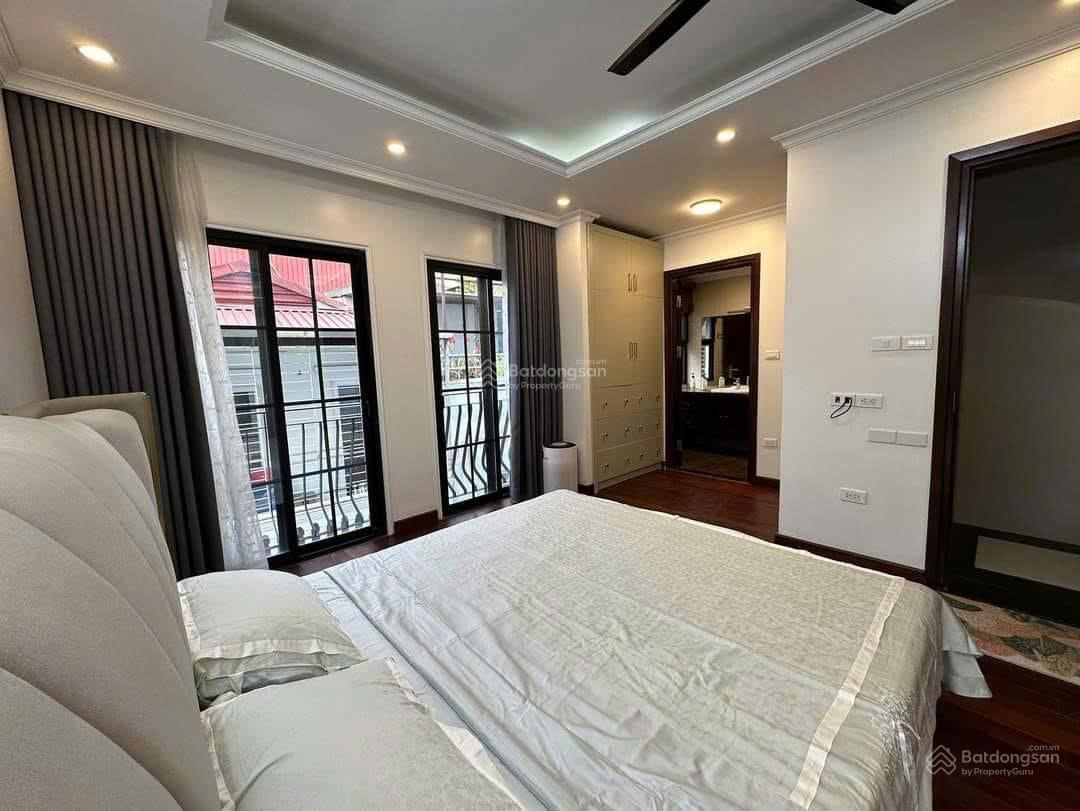 Cần bán nhà 2 mặt ngõ,dòng tiền khủng mặt ngõ, Ôtô, phố Vạn Bảo, DT 65m x 7 tầng, MT 5,2M Gía 21 tỷ