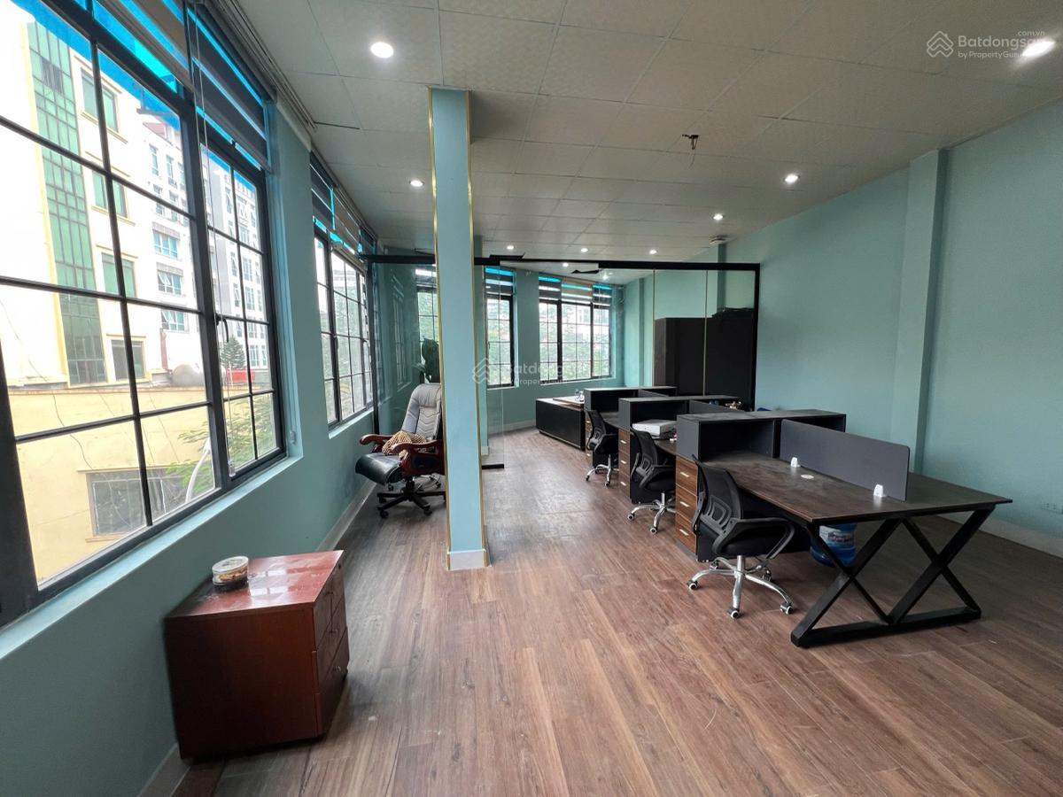 Bán toà nhà văn phòng 60m2, ngõ thông ôtô kinh doanh, mặt tiền bề thế, lô góc 3 thoáng, ôtô vào nhà