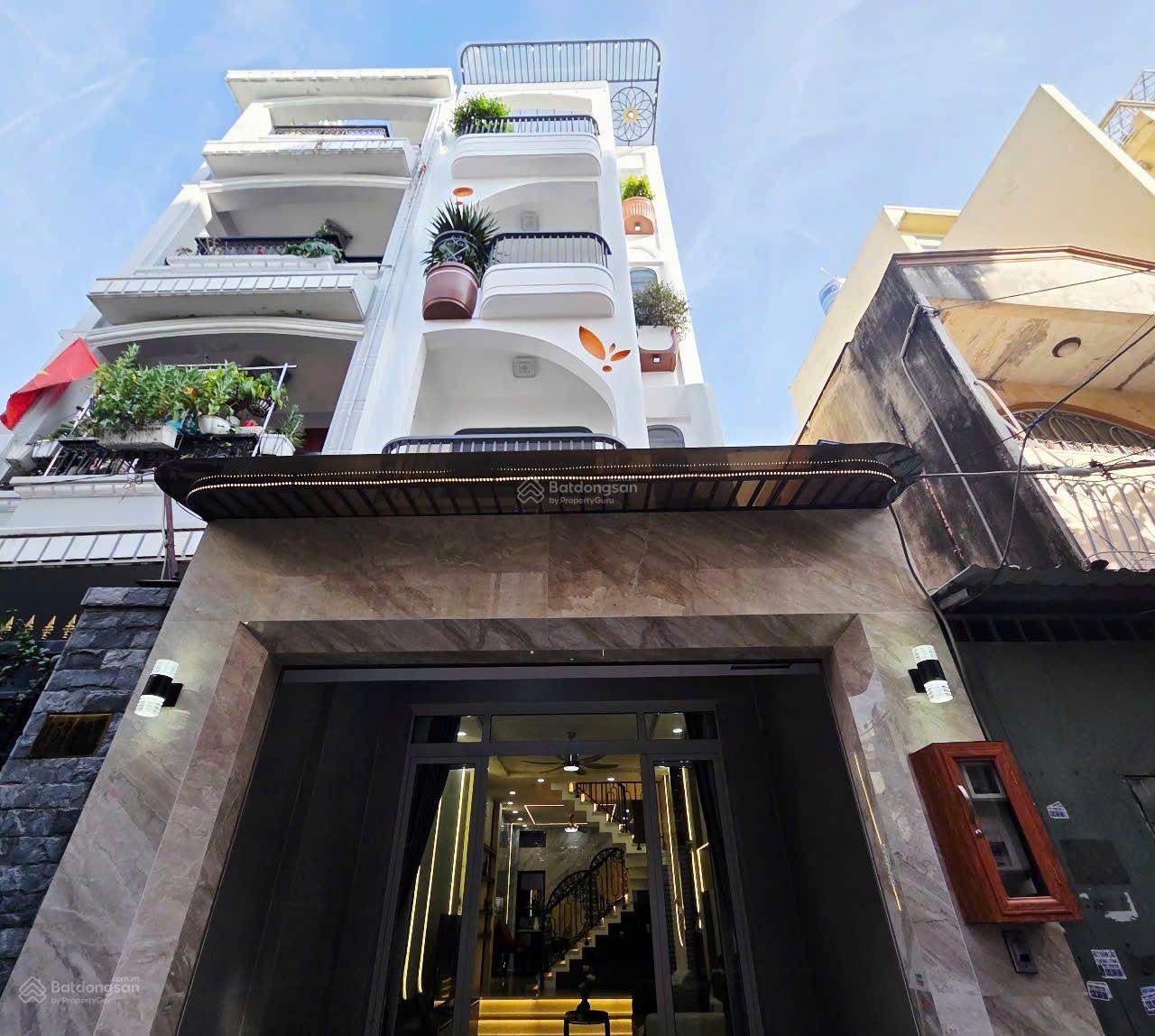 Nhà phố đường thông xe hơi Đường Huỳnh Văn Nghệ phường 15 Tân Bình diện tích: 4 x17 trệt 3 lầu