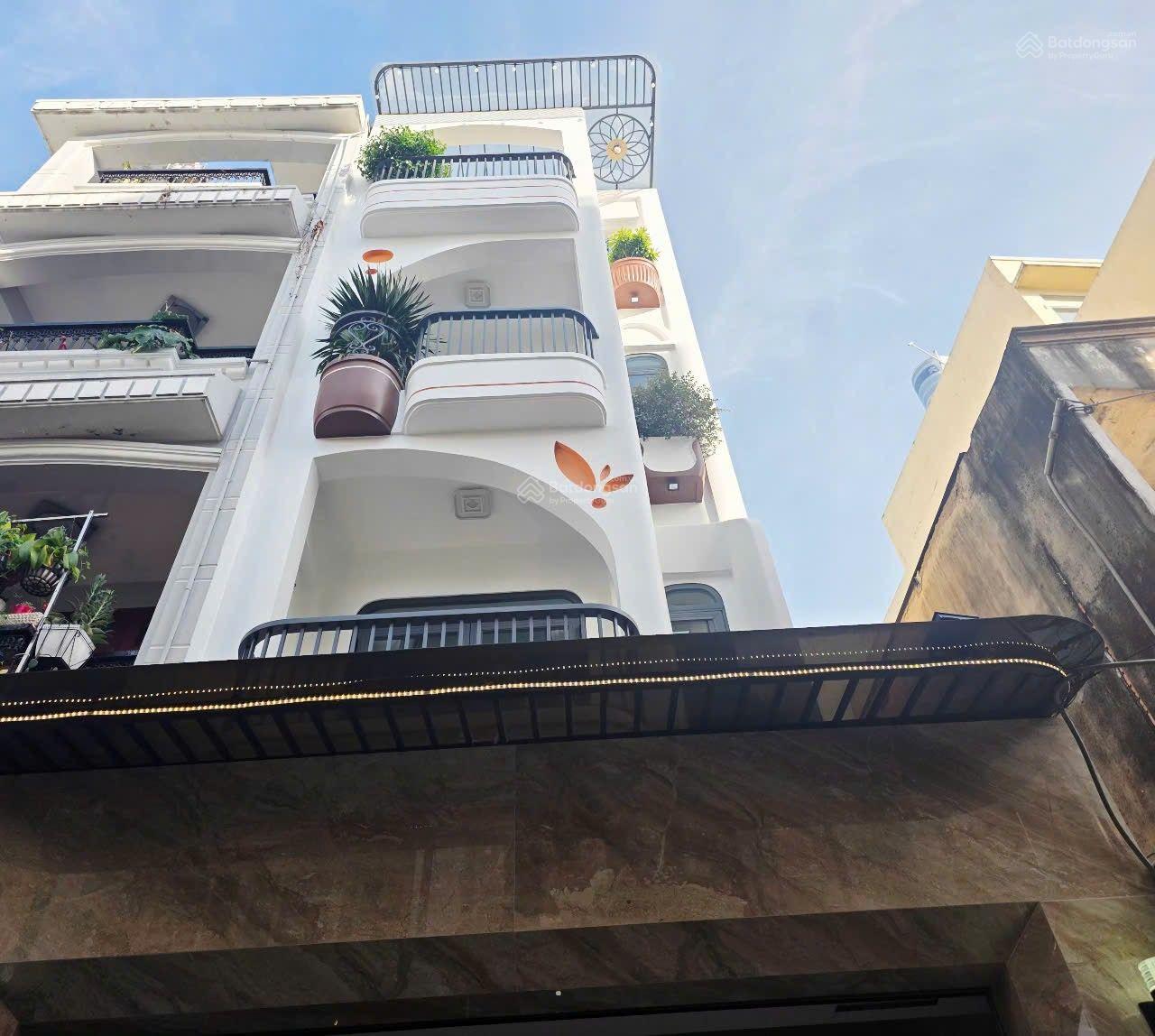 Nhà phố đường thông xe hơi Đường Huỳnh Văn Nghệ phường 15 Tân Bình diện tích: 4 x17 trệt 3 lầu