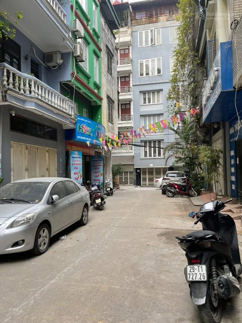 Bán nhà sổ đỏ chính chủ mặt ngõ phân lô bàn cờ Chùa Láng 60m2 x 5 T, MT 4,7m, 27 tỷ