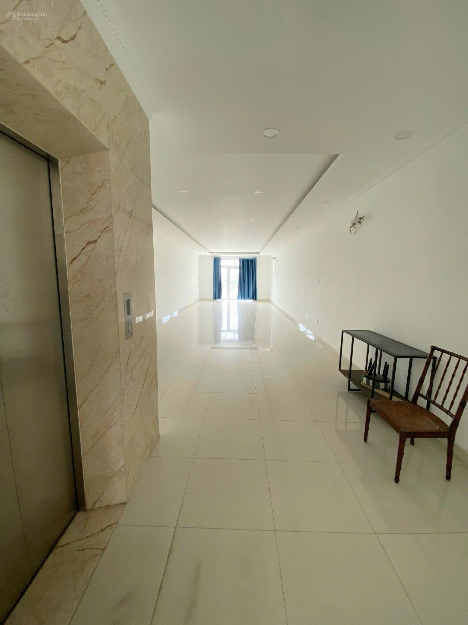 NHÀ 1 HẦM 4 LẦU SÂN THƯỢNG CẠNH BECAMEX TOWER