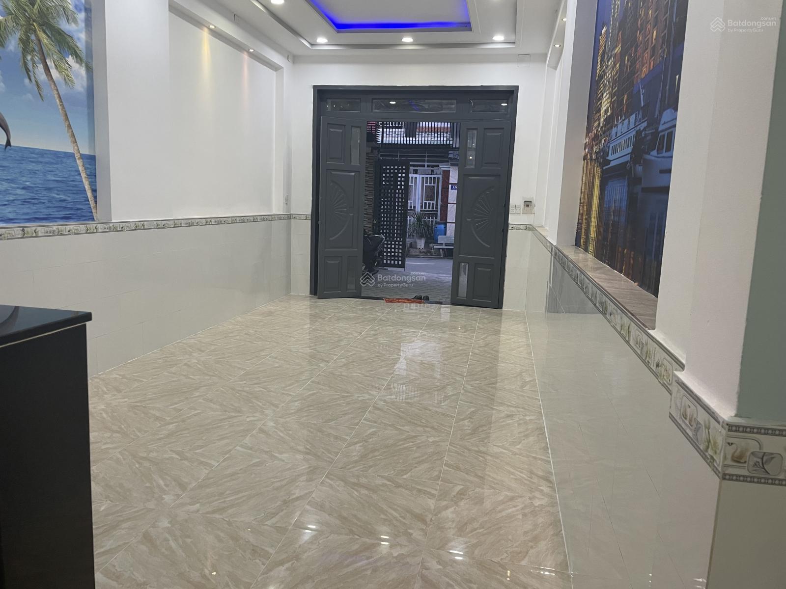 Bán nhà đường nhựa 8 m sân xe hơi trệt lầu gần trường học và chợ phường Tân Đông Hiệp , Dĩ an