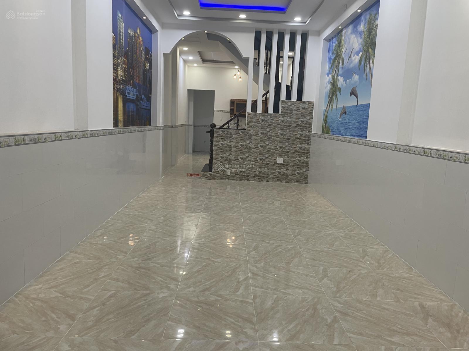 Bán nhà đường nhựa 8 m sân xe hơi trệt lầu gần trường học và chợ phường Tân Đông Hiệp , Dĩ an