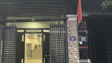 Bán nhà đường nhựa 8 m sân xe hơi trệt lầu gần trường học và chợ phường Tân Đông Hiệp , Dĩ an