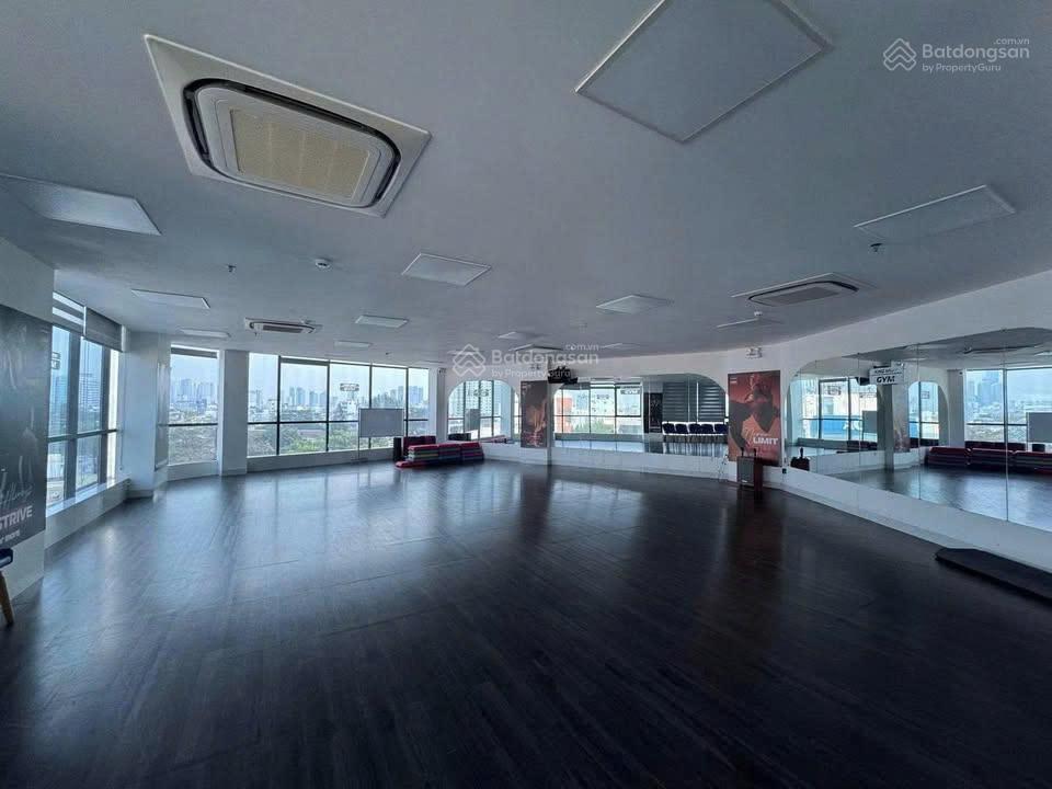 Cho thuê nhà góc 2MT Nơ Trang Long, Q.BT thang máy & PCCC DT 8.3x24m nở hậu 16m hầm trệt lửng 5 lầu