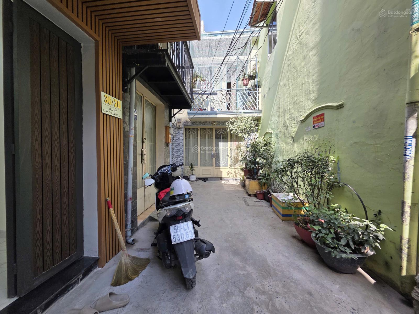 BÁN NHÀ SỔ RIÊNG-ĐƯỜNGTÂN MỸ- QUẬN 7..ĐỐI DIỆN TRƯỜNG MARKETING