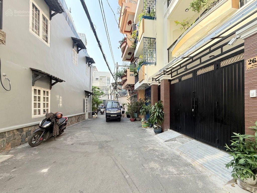 Xe hơi ngủ nhà đẹp 4 tầng thang máy đường Lê Quang Định 100m2 sát mặt tiền 15,5 tỉ có TL