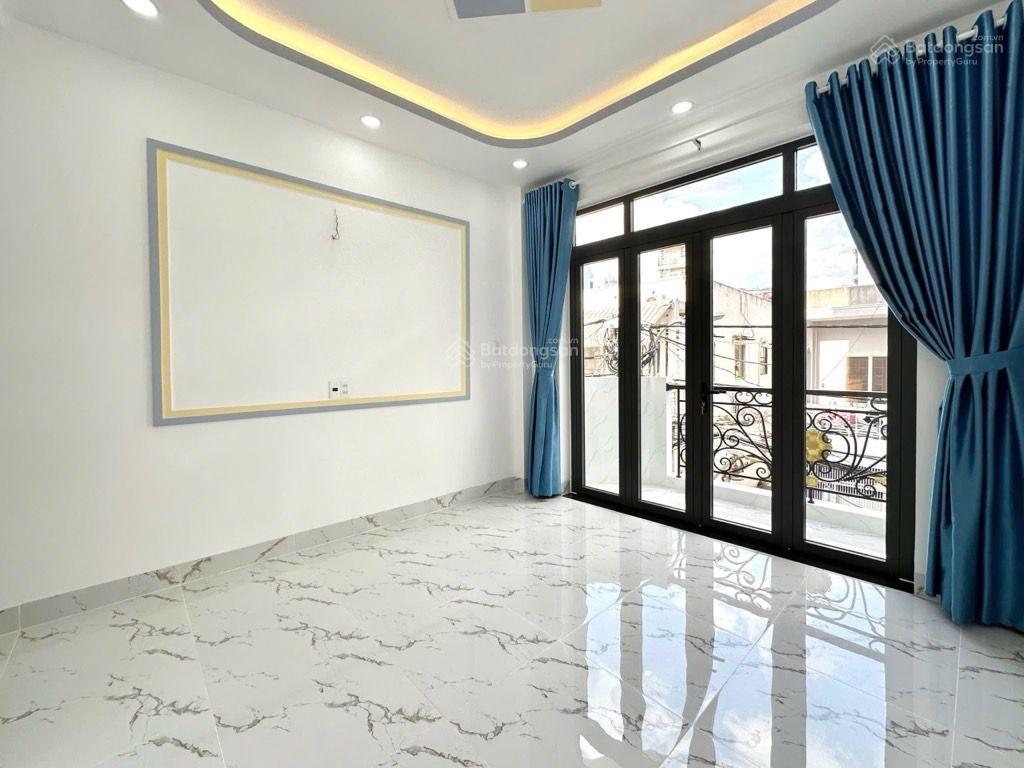 Xe hơi ngủ nhà đẹp 4 tầng thang máy đường Lê Quang Định 100m2 sát mặt tiền 15,5 tỉ có TL