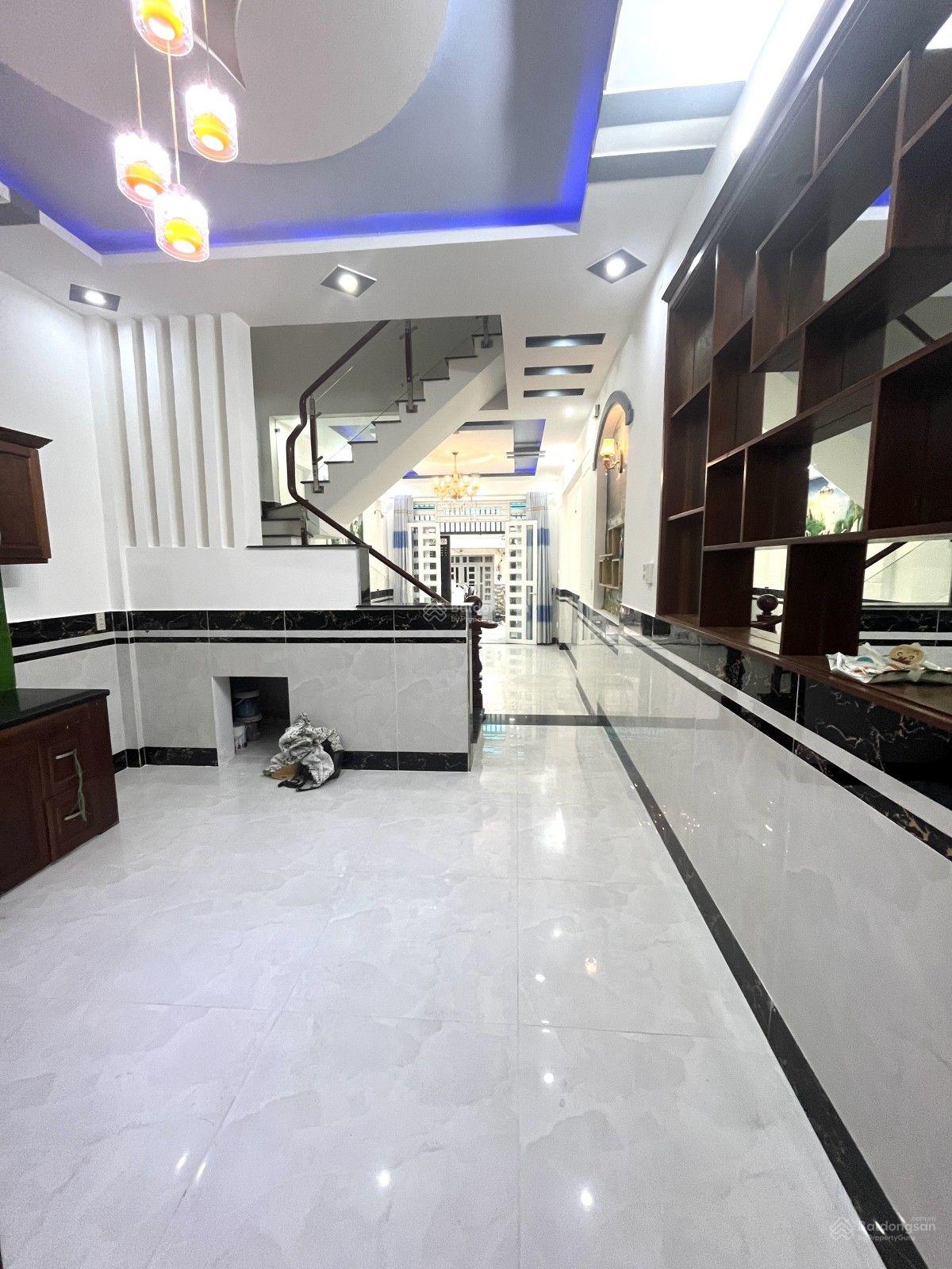 GIẢM NGAY 300TR CHỈ CÒN 5,3 TỶ DT: 4 x 16,5m nở hậu 4,2m Nhà 4 tầng Hẻm xe hơi 5M