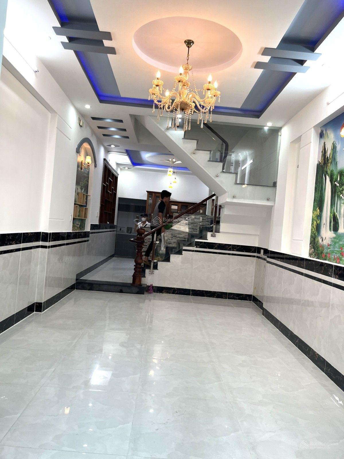 GIẢM NGAY 300TR CHỈ CÒN 5,3 TỶ DT: 4 x 16,5m nở hậu 4,2m Nhà 4 tầng Hẻm xe hơi 5M