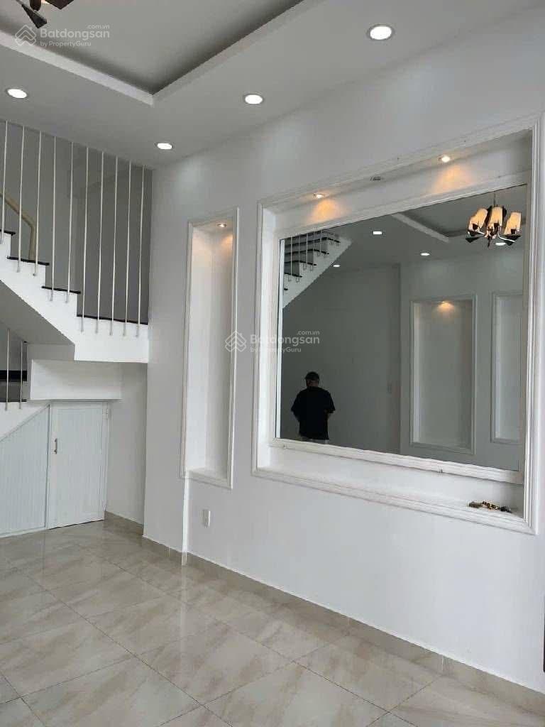 Bán gấp nhà mặt tiền 4 tầng hẻm xe hơi vào nhà - DT 74m2 - giá 13.6 tỷ