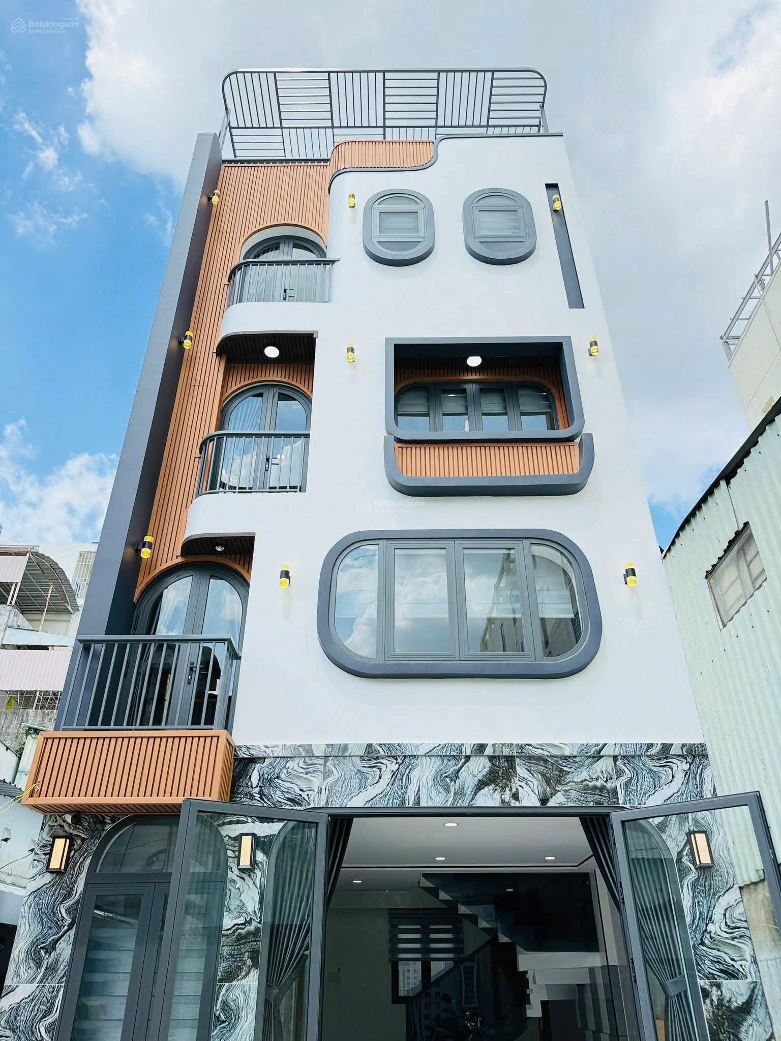 Nhà mới xây Phan Huy Ích - P. 12 gần Emart, diện tích 5,5mx15m, 4 lầu 4PN 6WC, 7,2 tỷ