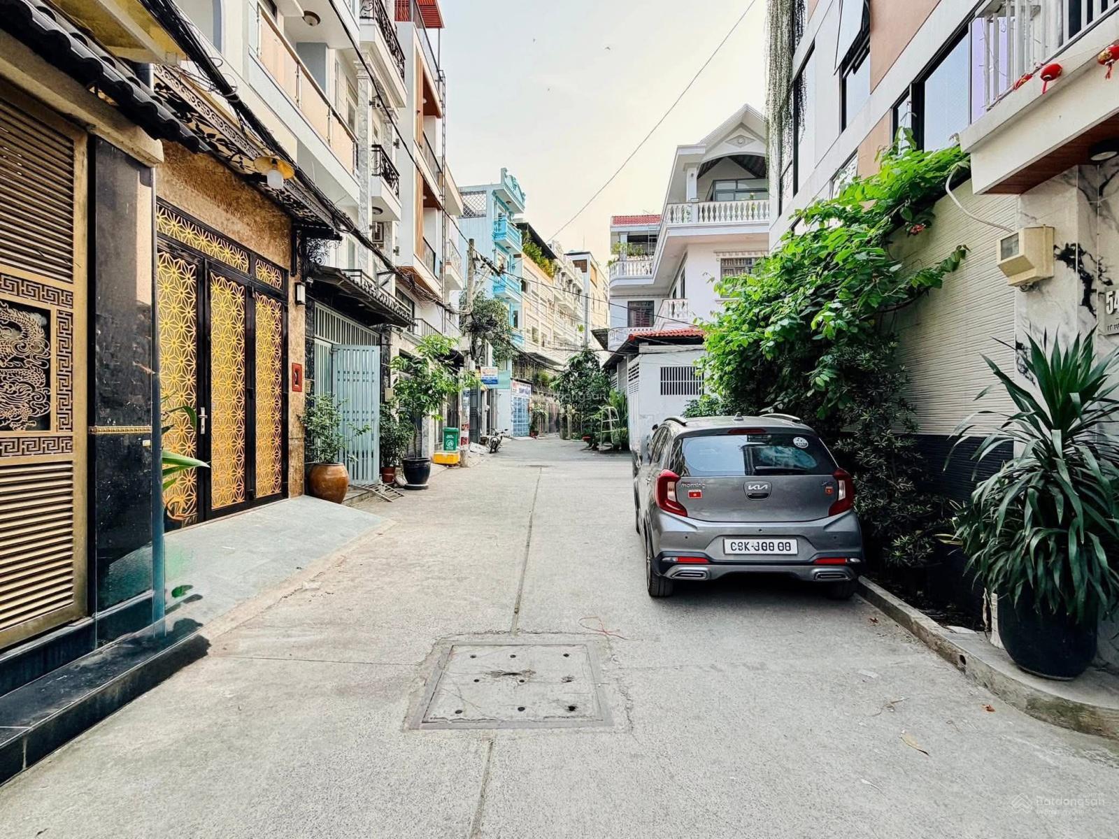 NHÀ XÂY MỚI 5 TẦNG 50m2 HẺM XE HƠI NGAY CHỢ RAU CỦ LÊ VĂN THỌ.