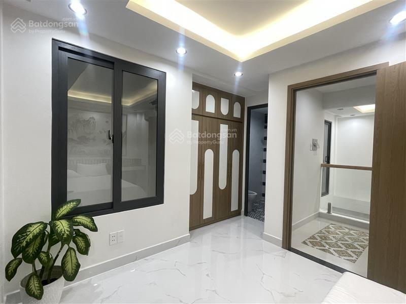 Xe hơi đỗ cửa nhà đẹp 6 tầng sát mặt tiền Phan Xích Long 50m2 ngang 5m, kinh doanh được, 9,3 tỉ TL Xe hơi đỗ cửa nhà đẹp 6 tầng sát mặt tiền Phan Xích Long 50m2 ngang 5m, kinh doanh được, 9,3 tỉ TL