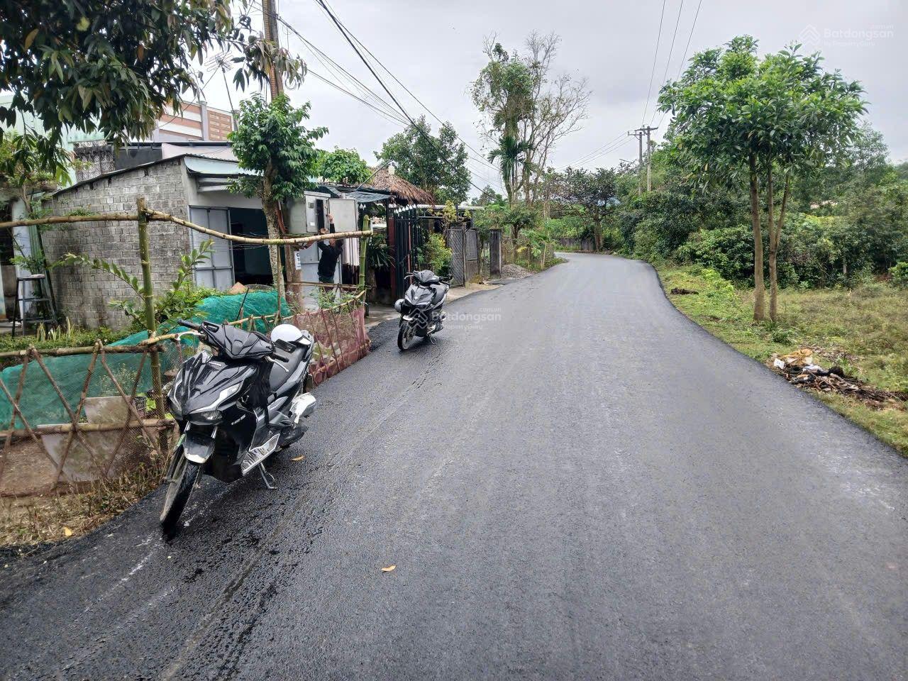 Đất đường nhựa 2 oto 128m2 đất ở cao ráo không ngập lụt.