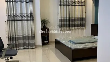 Nhà 100 m2 đối diện chung cư D1, KDC Phú Lợi 1 trệt 2 lầu 1 ST sổ hoàn công đầy đủ