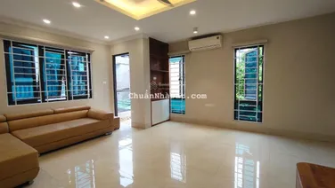 Hiếm! Doanh thu 50tr tháng phố Hồ Tùng Mậu, 69m2*8 tầng*14 phòng, dân xây, 15m ra ô tô, nhỉnh 12 tỷ