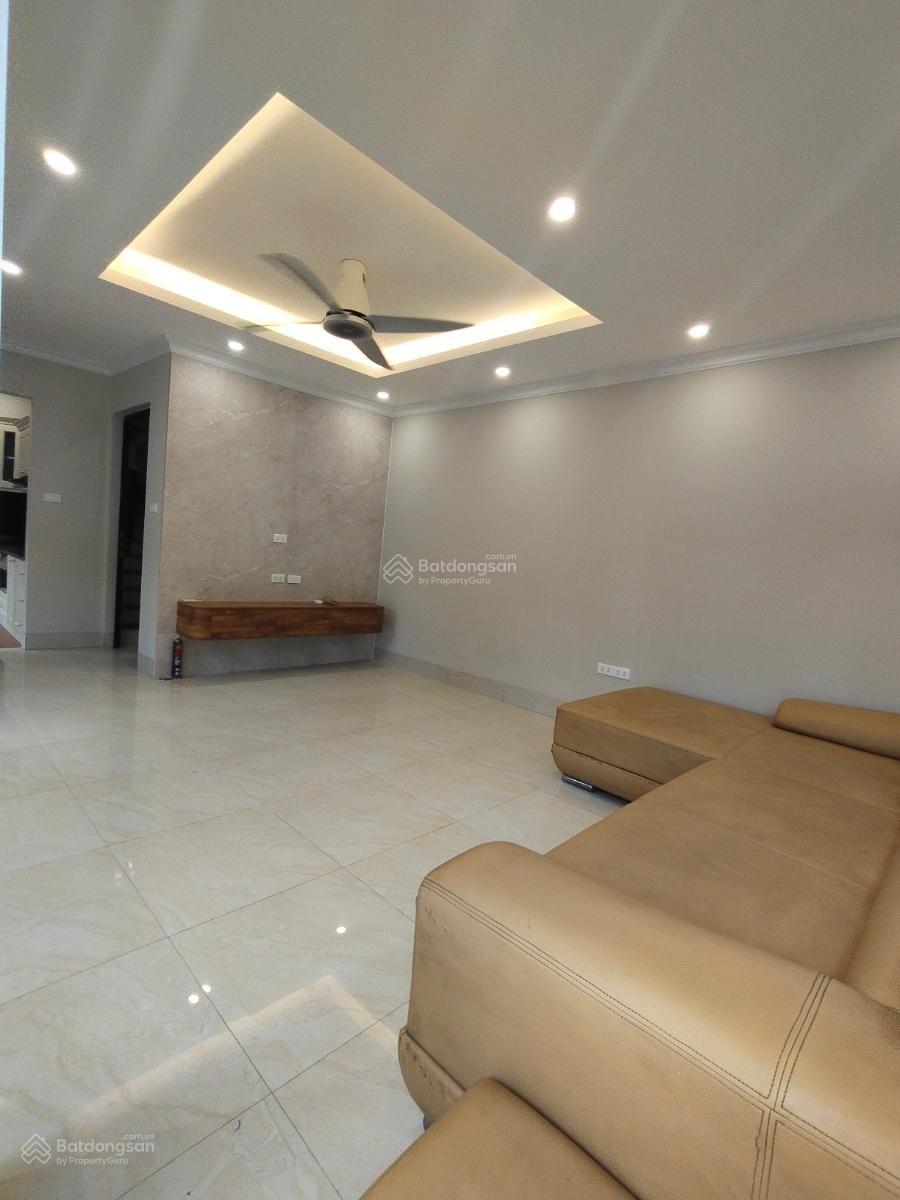 Hiếm! Doanh thu 50tr tháng phố Hồ Tùng Mậu, 69m2*8 tầng*14 phòng, dân xây, 15m ra ô tô, nhỉnh 12 tỷ