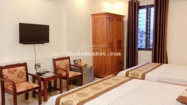 Bán khách sạn mini 14 phòng 2 phòng ngủ gia đình riêng. Diện tích đất 120m2 mặt tiền 8m