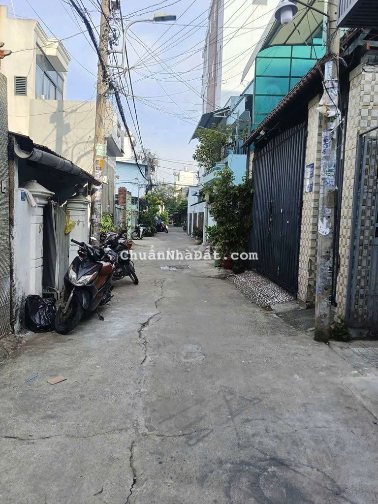 Cần bán nhà 1 xẹt song hành P ĐHT .Q12 .DT 4,1 x16 nở hậu 1 trệt 1 lầu