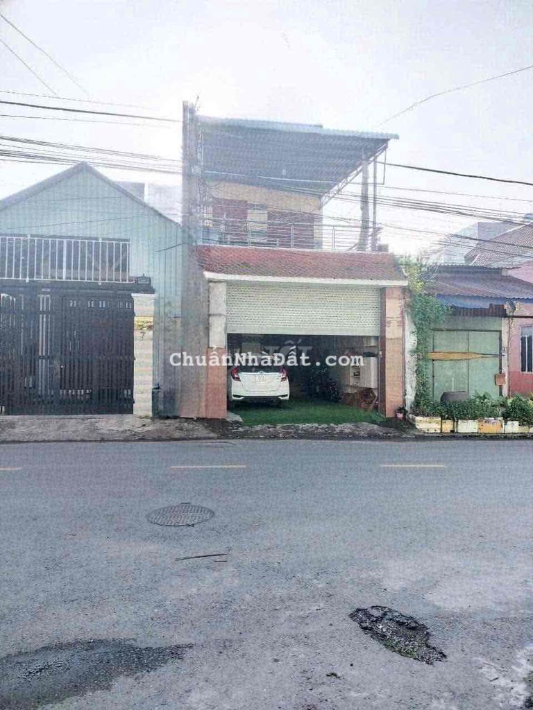 Nhà lầu sân xe hơi mặt tiền đông minh giá 10 triệu