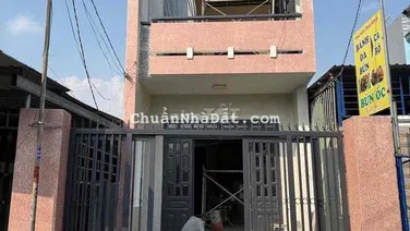 nhà lầu triệt đường xe hơi gần chợ Tân long