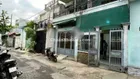 Cần bán gấp nhà P ĐHT Q12 .DT 6,7 *12 1 trệt 1 lầu hẻm xe hơi thông