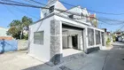 bán nhà trệt lầu sân xe hơi gần trung tâm y tế dĩ an