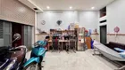 NHÀ 2 Tầng Mặt tiền đường ĐHT17, phường ĐHT, Q12, dt 105m2(10,5x10m),