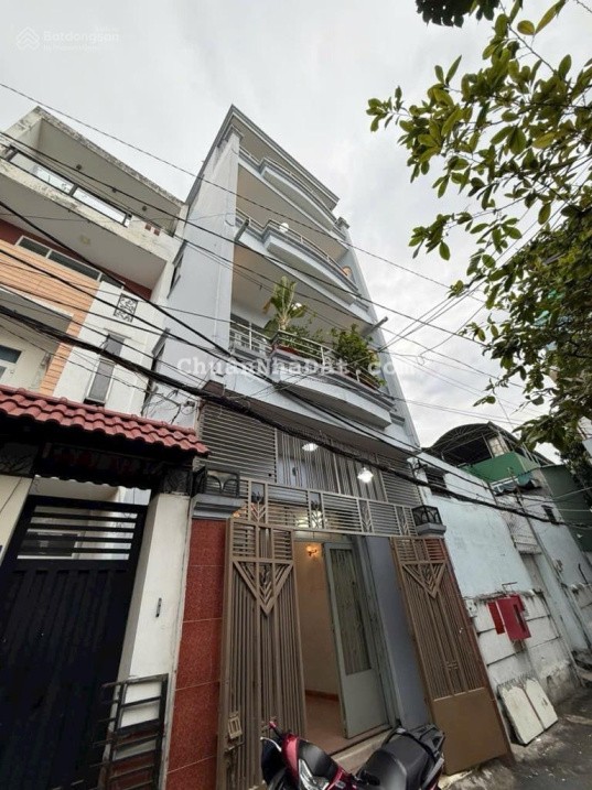 Nhà Nguyên Hồng, P1, sát Phạm Văn Đồng, hẻm xe hơi, 4 tầng lầu, giá 7 tỷ 850